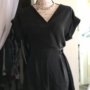 Black romper with buckle detail